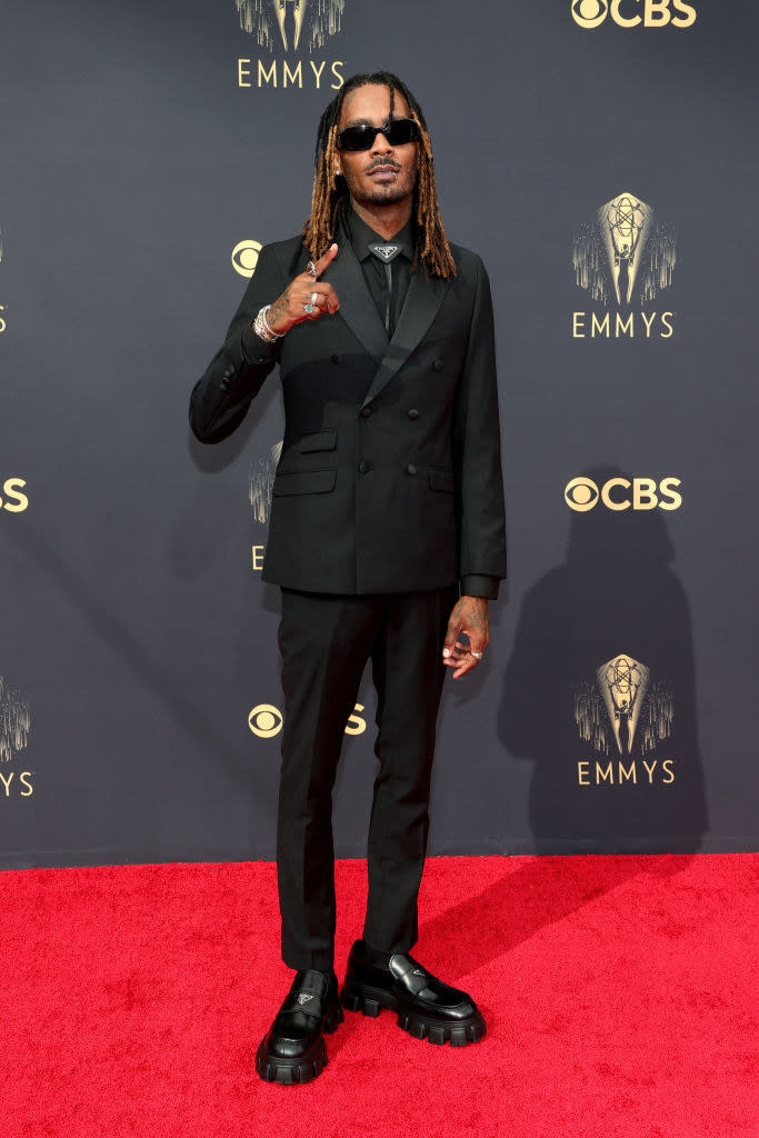 GaTa on the red carpet in an all black suit