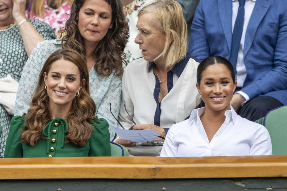 LONDON, ENGLAND - July 13:   Catherine, Duchess of Cambridge and Meghan, Duchess of Sussex in the Royal Box on Centre Court during the Serena Williams of the United States match against Simona Halep of Romania during the Ladies Singles Final on Centre Court during the Wimbledon Lawn Tennis Championships at the All England Lawn Tennis and Croquet Club at Wimbledon on July 13, 2019 in London, England. (Photo by Tim Clayton/Corbis via Getty Images)