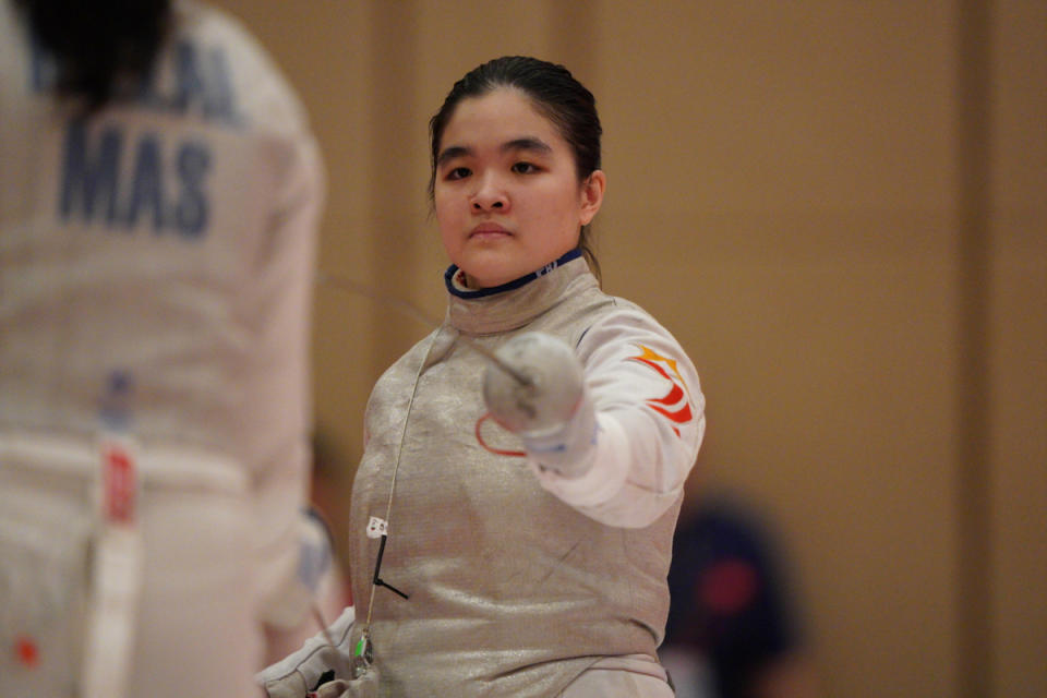 Singapore fencer Maxine Wong clinches gold in the women's individual foil event at the 2023 SEA Games. (PHOTO: Sport Singapore/Bryan Foo)