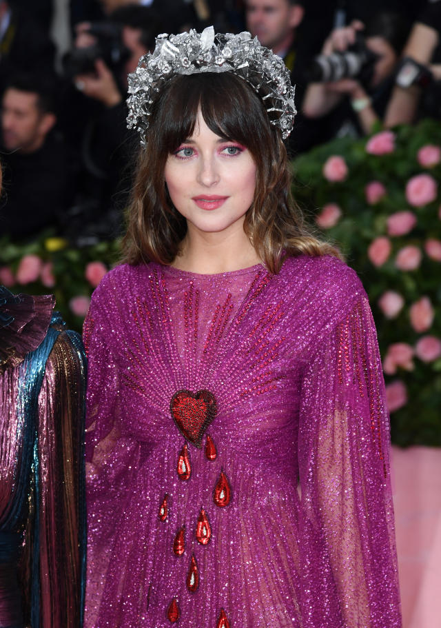 Here's Why Dakota Johnson Is Wearing a Bloody Heart Dress at the