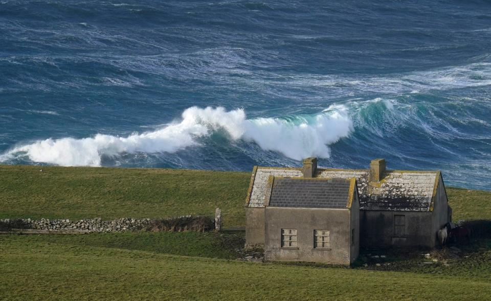 Waves crashing against the shore at Doolin in County Clare on the west coast of Ireland (PA)