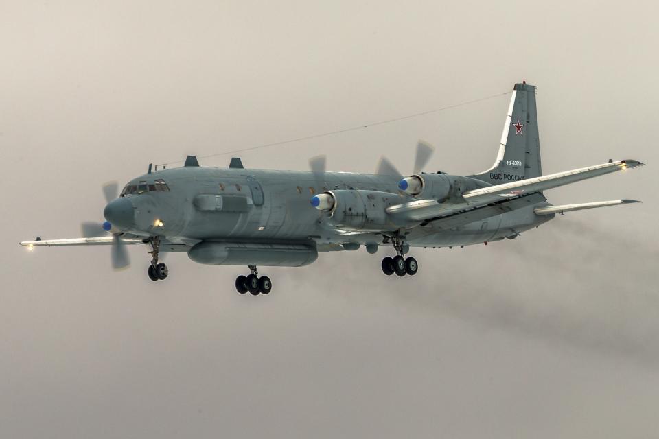 FILE- In this file photo taken on Saturday, March 4, 2017, The Russian Il-20 electronic intelligence plane of the Russian air force with the registration number RF 93610, which was accidentally downed by Syrian forces responding to an Israeli air strike flies near Kubinka airport, outside Moscow, Russia. The Russian Defense Ministry on Sunday Sept. 23, 2018, has renewed its accusations against Israel for causing the downing of a Russian military plane over Syria. (AP Photo/Marina Lystseva)