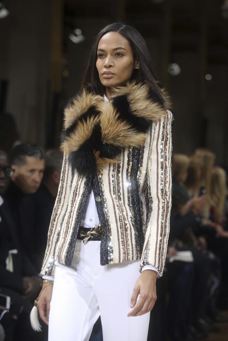 A model wears a creation for Lanvin's Fall-Winter 2017-2018 ready to wear fashion collection presented in Paris, Wednesday, March 1, 2017. (AP Photo/Thibault Camus)