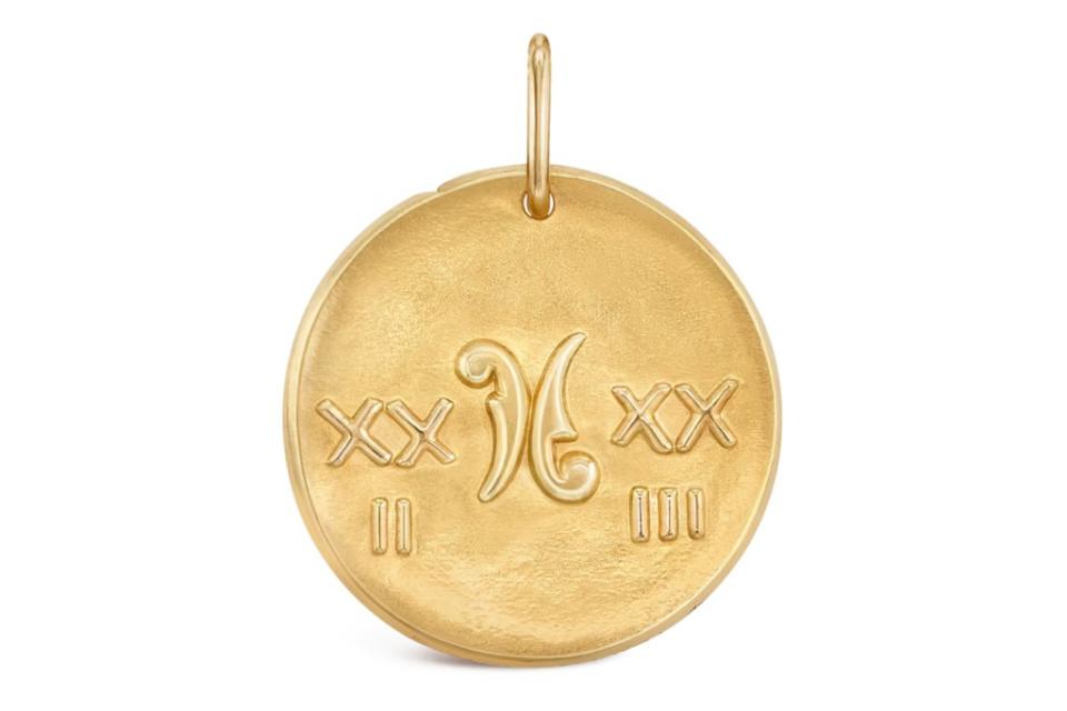Van Cleef & Arpels Zodiaque Piscium medal in 18-k yellow gold, $2,430