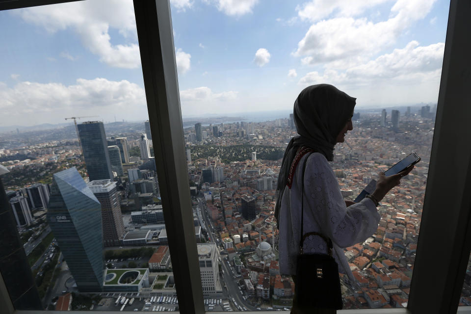 A view of the financial and commercial Levent district, where many of Turkey's leading banks and companies have their headquarters, as seen from an observation deck on a nearby building, in Istanbul, Thursday, Aug. 16, 2018. Beset by a weak currency and tension with the United States, Turkey is reaching out to Europe in an attempt to shore up relations with major trading partners despite years of testy rhetoric and a stalled bid for EU membership. The overtures by Turkish President Recep Tayyip Erdogan, who has harshly criticized Germany and other European nations in the past, are part of a diplomatic campaign to capitalize on international unease over U.S. President Donald Trump and American tariff disputes. (AP Photo/Lefteris Pitarakis)