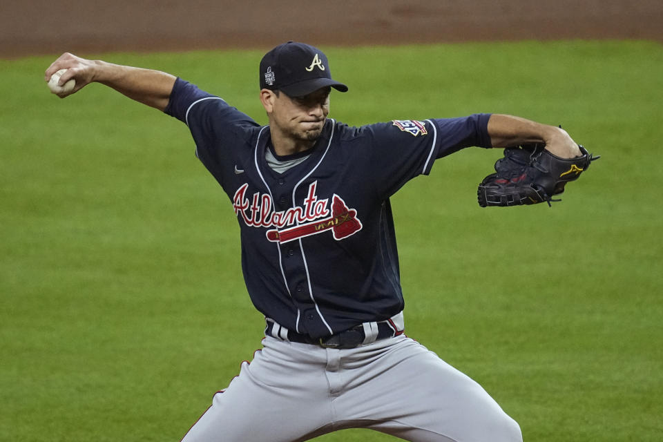 Atlanta Braves starting pitcher Charlie Morton throws during the first inning of Game 1 in baseball's World Series between the Houston Astros and the Atlanta Braves Tuesday, Oct. 26, 2021, in Houston. (AP Photo/Eric Gay)