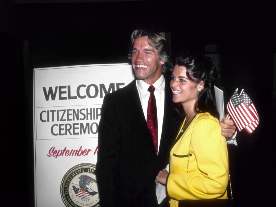 Arnold Schwarzenegger poses with Maria Shriver after becoming a US citizen.