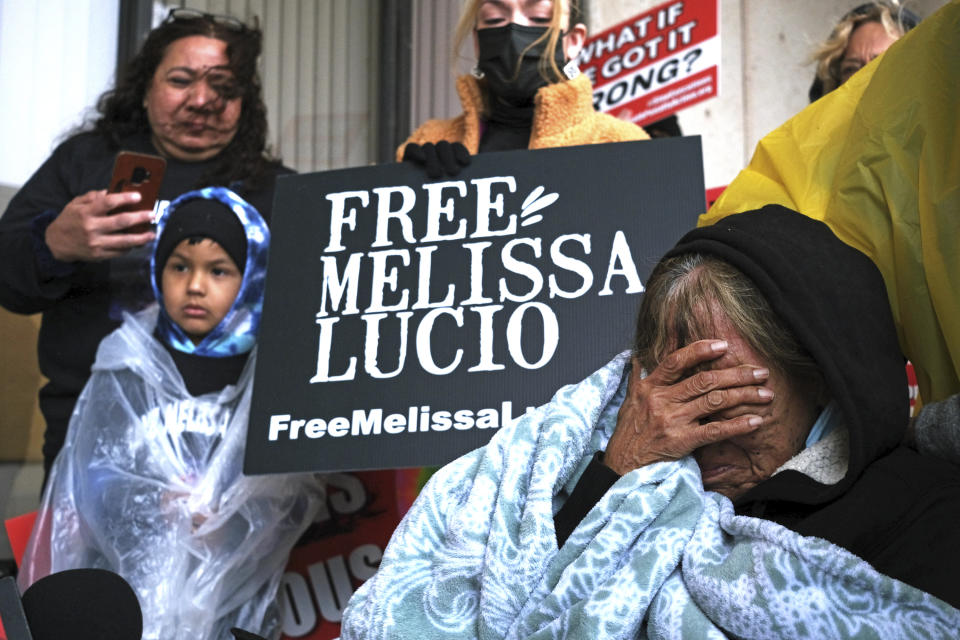 FILE - Esperanza Treviño, Melissa Lucio's mother, pleas to the public as she is surrounded by family and friends on the steps of the Cameron County Courthouse Administrative entrance in Brownsville, Texas, Feb. 7, 2022, that her daughter is innocent and was wrongfully sentenced to death for the murder of Lucio's 2-year-old daughter. A judge has recommended that the conviction and death sentence of Lucio, a Texas woman whose execution was delayed in 2022 amid growing doubts she fatally beat her 2-year-old daughter, should be overturned amid findings that evidence in her murder trial was suppressed. (Miguel Roberts/The Brownsville Herald via AP, File)