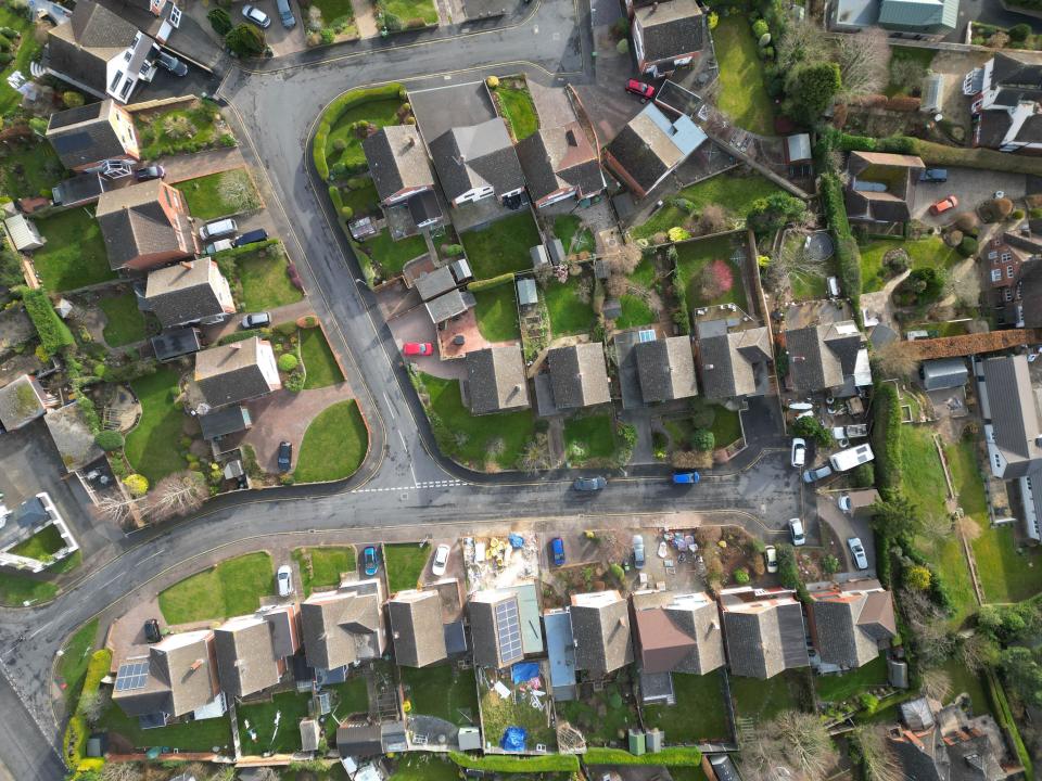 Aerial view of detached houses on a cul-de-sac in the suburbs of Hereford, UK, in February 2024. Real Estate: The number of homes for sale is a fifth higher than a year ago and buyer demand is also up 11%.