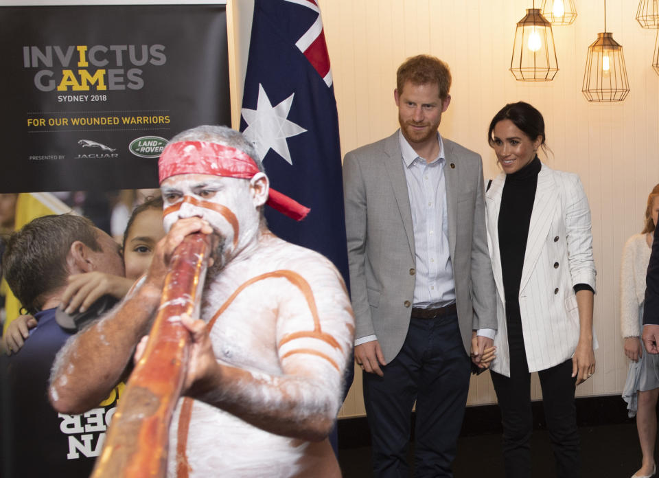 The couple watched a didgeridoo performance on Sunday afternoon. (Photo: Pool via Getty Images)