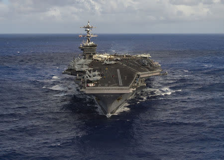 The aircraft carrier USS Carl Vinson (CVN 70) transits the Pacific Ocean January 30, 2017. U.S. Navy Photo by Mass Communication Specialist 3rd Class Tom Tonthat/Handout via Reuters