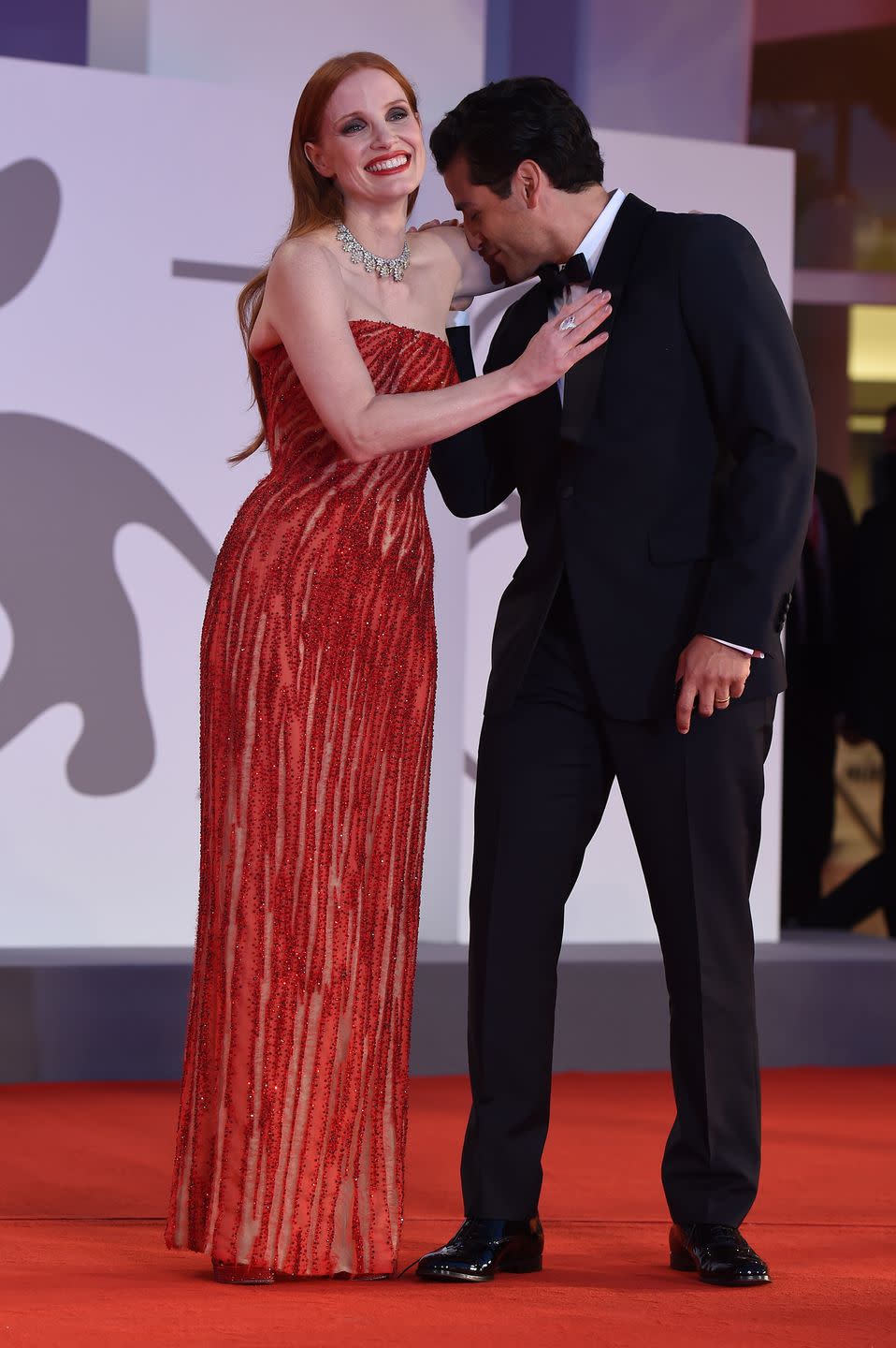 <p>Things got <em>intense</em> between Jessica Chastain and Oscar Isaac at the 2021 Venice Film International Festival. Arm kisses, loving looks, face caresses...let's just say the tension was thick. It would've been cute if they weren't both married to other people.</p>