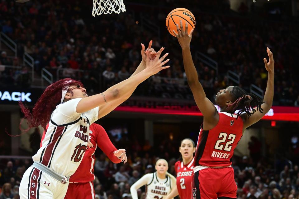 North Carolina State guard Saniya Rivers (22) shoots the ball over South Carolina center Kamilla Cardoso (10) during Friday's national semifinal game at Rocket Mortgage FieldHouse,