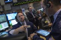 Traders work on the floor of the New York Stock Exchange, October 25, 2013. REUTERS/Brendan McDermid