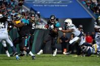 Nov 12, 2017; Jacksonville, FL, USA; Jacksonville Jaguars running back Leonard Fournette (27) runs the ball against the Los Angeles Chargers during the first half at EverBank Field. Mandatory Credit: Jasen Vinlove-USA TODAY Sports