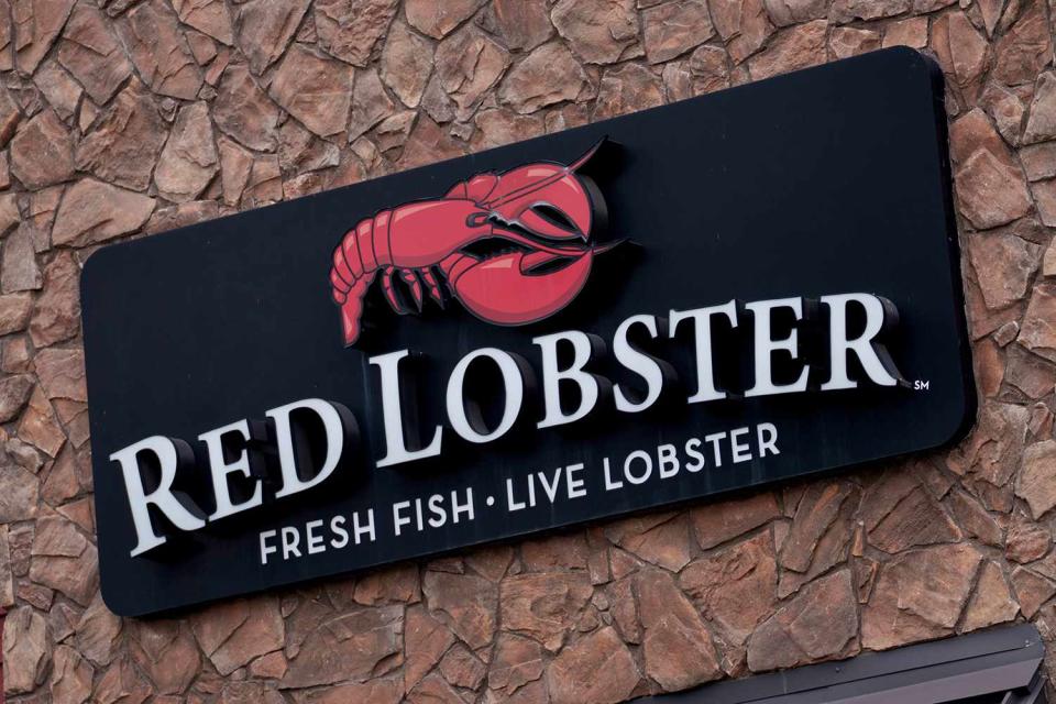 <p>Eric Thayer/Bloomberg via Getty Images</p> A stock photo of a Red Lobster sign