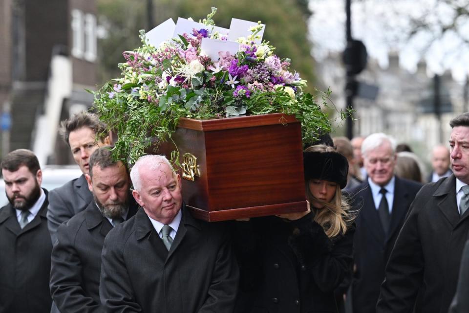 Darcey Draper carries her father’s coffin at the funeral service in London (Getty Images)