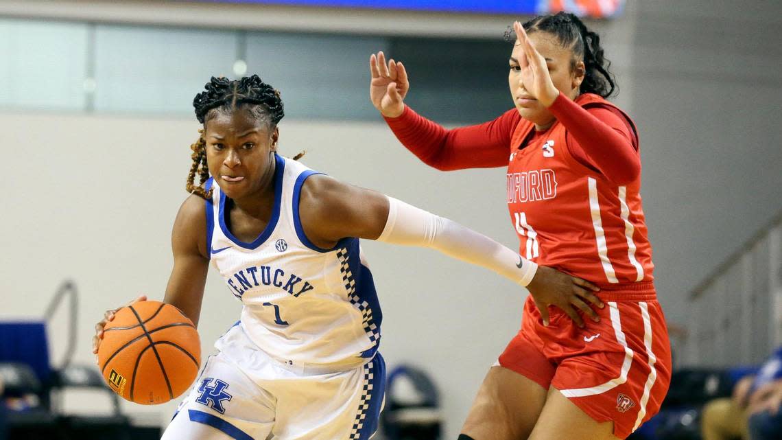 Kentucky’s Robyn Benton (1) drives against Radford’s Ashlyn Traylor (11) on Monday night in Memorial Coliseum. Benton scored 17 points in the Wildcats’ win.