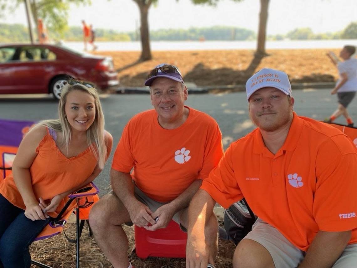 Robby Shealy (middle) tailgates with his daughter, Betsy, and his son, Bartlett, ahead of a Clemson football game. Robby has attended 324 consecutive home games dating back to 1972.