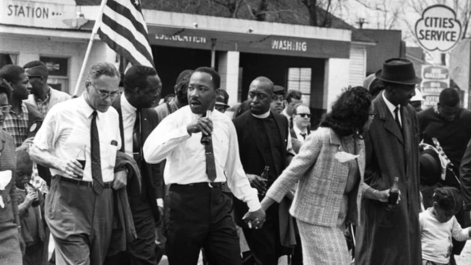 In this March 1965 photo, Dr. Martin Luther King Jr. (center) and his wife, <span class="caas-xray-inline-tooltip"><span class="caas-xray-inline caas-xray-entity caas-xray-pill rapid-nonanchor-lt" data-entity-id="Coretta_Scott_King" data-ylk="cid:Coretta_Scott_King;pos:2;elmt:wiki;sec:pill-inline-entity;elm:pill-inline-text;itc:1;cat:Writer;" tabindex="0" aria-haspopup="dialog"><a href="https://search.yahoo.com/search?p=Coretta%20Scott%20King" data-i13n="cid:Coretta_Scott_King;pos:2;elmt:wiki;sec:pill-inline-entity;elm:pill-inline-text;itc:1;cat:Writer;" tabindex="-1" data-ylk="slk:Coretta Scott King;cid:Coretta_Scott_King;pos:2;elmt:wiki;sec:pill-inline-entity;elm:pill-inline-text;itc:1;cat:Writer;" class="link ">Coretta Scott King</a></span></span> (right) lead a civil rights march from Selma, Alabama, to the state capital, Montgomery as diplomat Ralph Bunche (left) listens to King. Successful movements, said Sen. <span class="caas-xray-inline-tooltip"><span class="caas-xray-inline caas-xray-entity caas-xray-pill rapid-nonanchor-lt" data-entity-id="Raphael_Warnock" data-ylk="cid:Raphael_Warnock;pos:3;elmt:wiki;sec:pill-inline-entity;elm:pill-inline-text;itc:1;cat:Politician;" tabindex="0" aria-haspopup="dialog"><a href="https://search.yahoo.com/search?p=Raphael%20Warnock" data-i13n="cid:Raphael_Warnock;pos:3;elmt:wiki;sec:pill-inline-entity;elm:pill-inline-text;itc:1;cat:Politician;" tabindex="-1" data-ylk="slk:Raphael Warnock;cid:Raphael_Warnock;pos:3;elmt:wiki;sec:pill-inline-entity;elm:pill-inline-text;itc:1;cat:Politician;" class="link ">Raphael Warnock</a></span></span>, don’t always begin with lawmakers. (Photo: William Lovelace/Express/Getty Images)