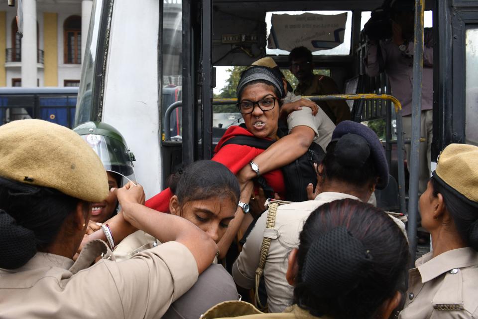 Police arrest a protester at the Town Hall during a demonstration held against India's new citizenship law in spite of a curfew in Bangalore on December 19, 2019. - Indians defied bans on assembly on December 19 in cities nationwide as anger swells against a citizenship law seen as discriminatory against Muslims, following days of protests, clashes and riots that have left six dead. (Photo by Manjunath Kiran / AFP) (Photo by MANJUNATH KIRAN/AFP via Getty Images)