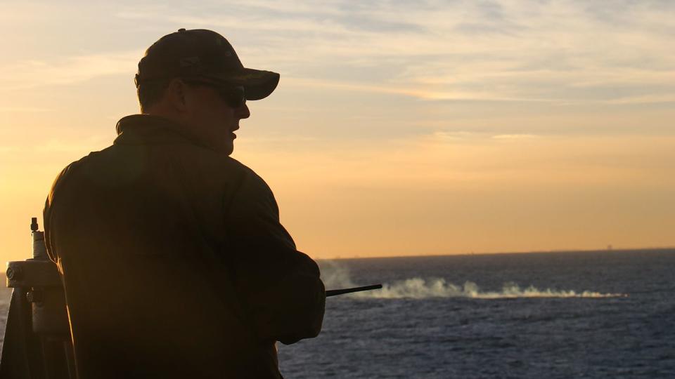 Cmdr. Brad A. Fancher, commanding officer of the dock landing ship USS Carter Hall (LSD 50), observes the debris field of a high-altitude surveillance balloon. Carter Hall is the lead ship in debris recovery efforts led by the Navy, in joint partnership with the U.S. Coast Guard, with multiple units in support of the effort, including ships, aircraft, and an Explosive Ordnance Disposal mobile diving and salvage unit. At the direction of the President of the United States and with the full support of the Government of Canada, U.S. fighter aircraft under U.S. Northern Command authority engaged and brought down a high altitude surveillance balloon within sovereign U.S. airspace and over U.S. territorial waters Feb. 4, 2023.  Active duty, Reserve, National Guard, and civilian personnel planned and executed the operation, and partners from the U.S. Coast Guard, Federal Aviation Administration, and Federal Bureau of Investigation ensured public safety throughout the operation and recovery efforts.