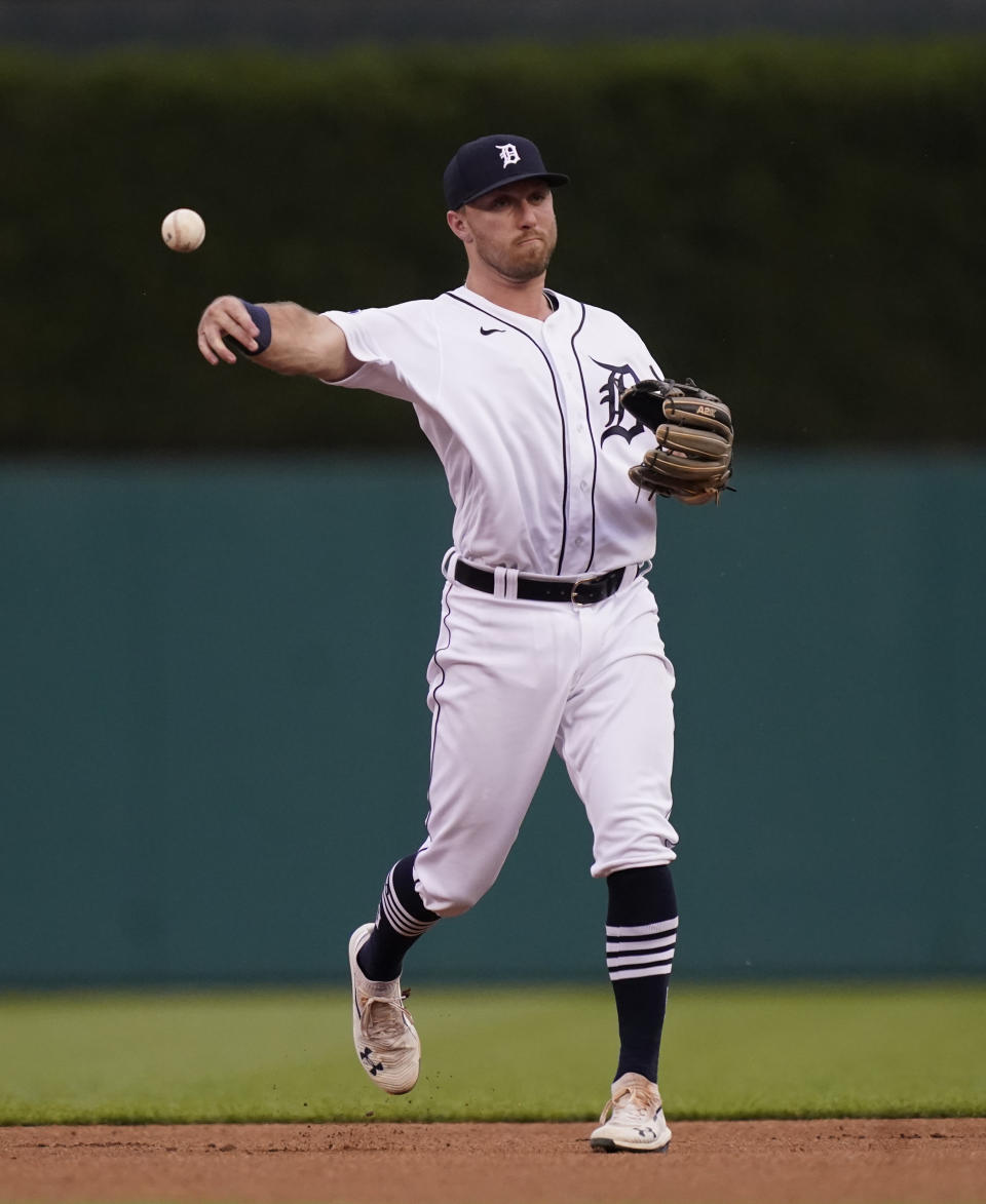 Detroit Tigers second baseman Kody Clemens throws to first during the fifth inning of the second baseball game of a doubleheader against the Minnesota Twins, Tuesday, May 31, 2022, in Detroit. (AP Photo/Carlos Osorio)