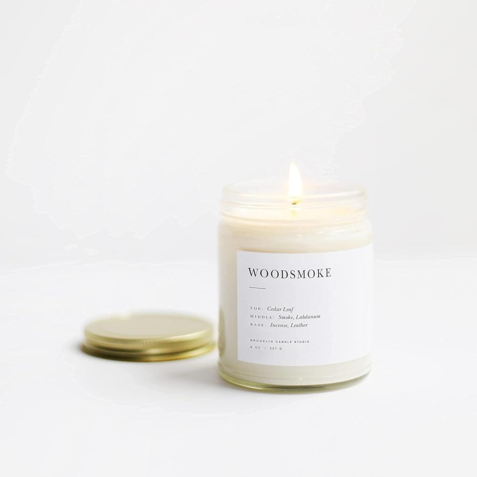 <p><a href="https://www.amazon.com/Brooklyn-Candle-Studio-Minimalist-Woodsmoke/dp/B07YSBMPS4/?tag=syn-yahoo-20&ascsubtag=%5Bartid%7C10057.g.46660653%5Bsrc%7Cyahoo-us" rel="nofollow noopener" target="_blank" data-ylk="slk:Shop Now;elm:context_link;itc:0;sec:content-canvas" class="link ">Shop Now</a></p><p>The Brooklyn Candle Studio</p><p>amazon.com</p><p>$30.95</p>