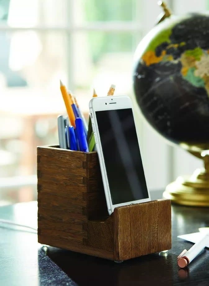 the pencil and phone holder