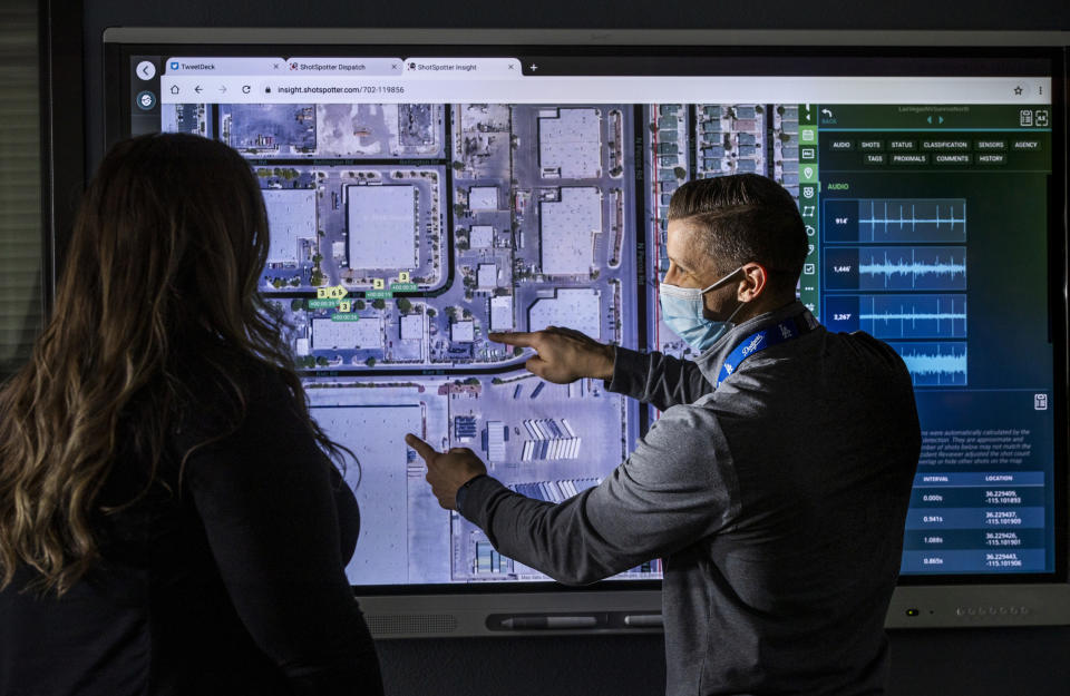 FILE - Law enforcement personnel use an interactive electronic map for the ShotSpotter Dispatch program running within the Fusion Watch department at the Las Vegas Metropolitan Police Headquarters Wednesday, Jan. 13, 2021, in Las Vegas. In more than 140 cities across the United States in 2023, ShotSpotter’s artificial intelligence algorithm and its intricate network of microphones evaluate hundreds of thousands of sounds a year to determine if they are gunfire, generating data now being used in criminal cases nationwide. (L.E. Baskow/Las Vegas Review-Journal via AP, File)