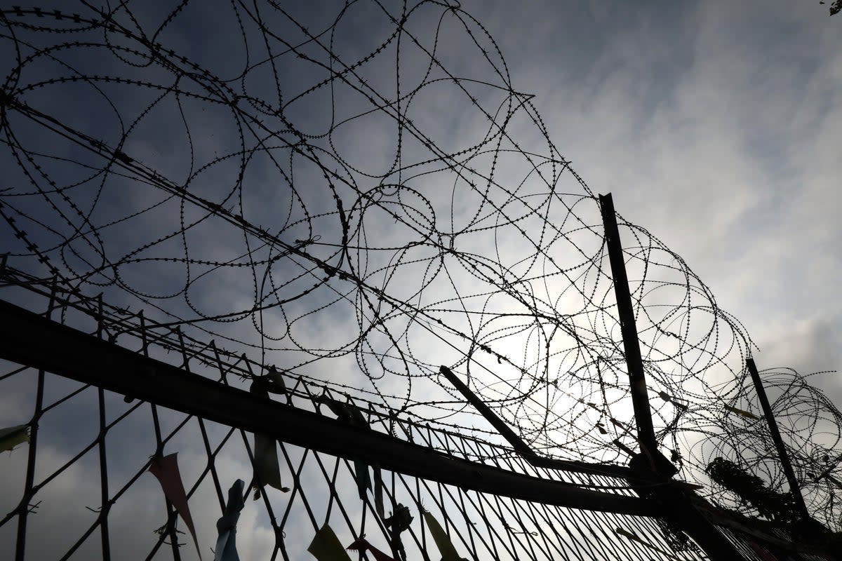 A barbed-wired fence is seen at the Imjingak Pavilion, near the demilitarized zone (DMZ) on 19 July 2023 in Paju, South Korea   (Getty Images)