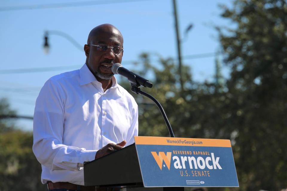 U.S. Sen. Raphael Warnock speaks to a crowd during a rally at Conner's Baptist Church in Savannah Oct. 6.