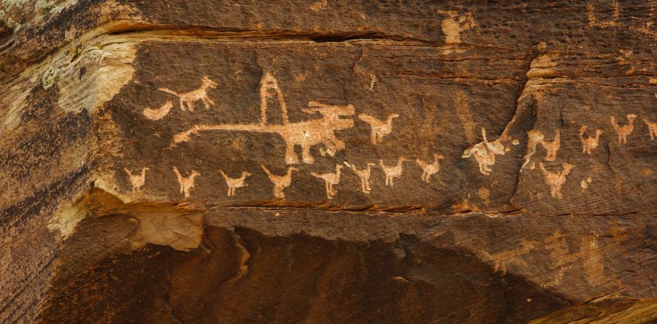 Animal petroglyphs are carved into rock near the Puerco River at Petrified Forest National Park.