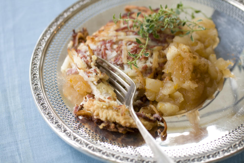 This Oct. 7, 2013 photo shows latke crusted turkey cutlet and Meyer lemon applesauce. (AP Photo/Matthew Mead)