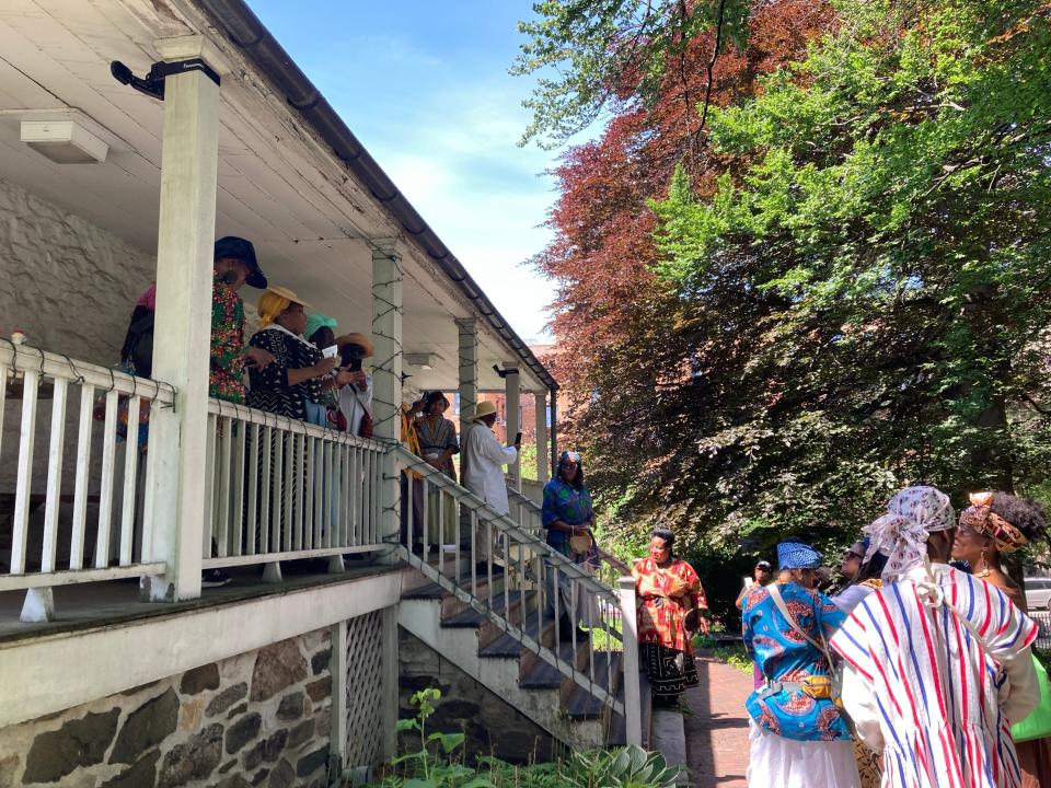 A small crowd gathered at the Dyckman Farmhouse Museum in New York City on Saturday, May 25, 2024, to celebrate Pinkster. About a dozen people trekked seven miles in Manhattan to honor enslaved and free African people who celebrated the holiday in colonial New York.