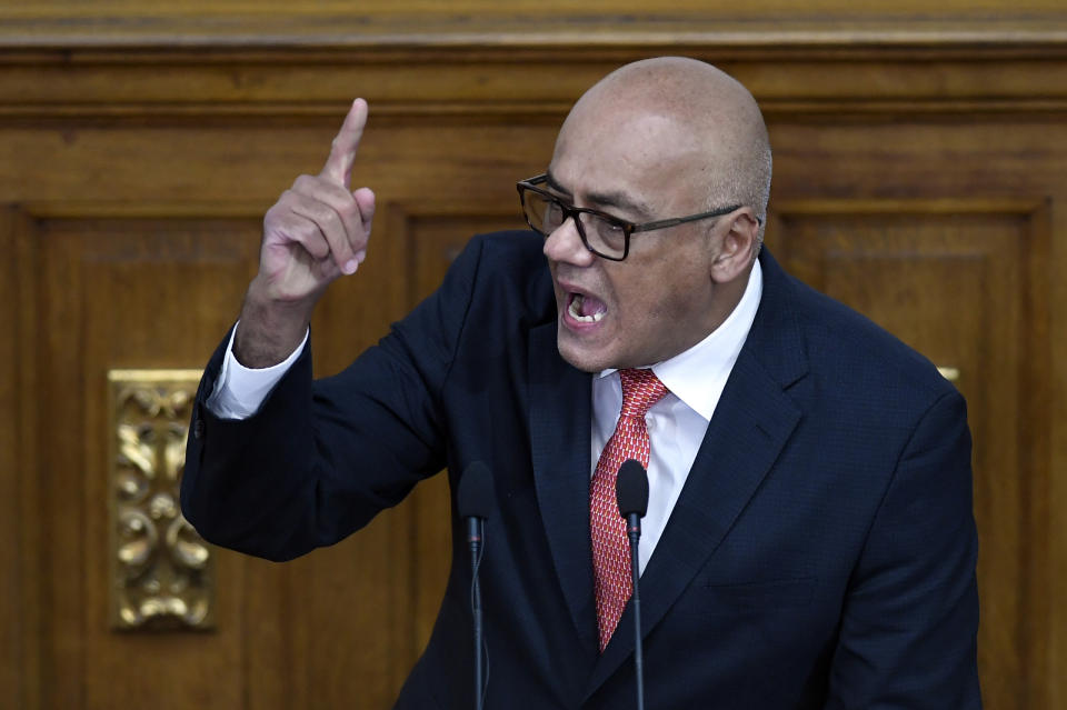 New National Assembly President Jorge Rodriguez addresses newly sworn-in lawmakers at Congress in Caracas, Venezuela, Tuesday, Jan. 5, 2021. The ruling socialist party assumed the leadership of Venezuela's congress on Tuesday, the last institution in the country it didn't already control. (AP Photo/Matias Delacroix)