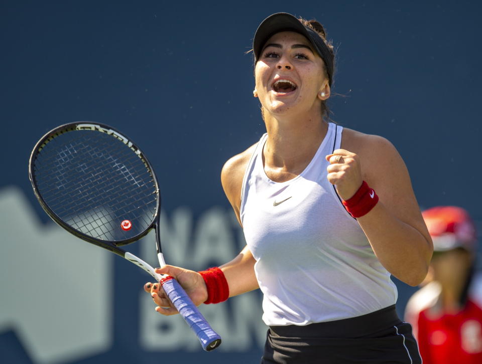 Bianca Andreescu of Canada celebrates her victory over Kiki Bertens of the Netherlands during the Rogers Cup women’s tennis tournament Thursday, Aug. 8, 2019, in Toronto. (Frank Gunn/The Canadian Press via AP)