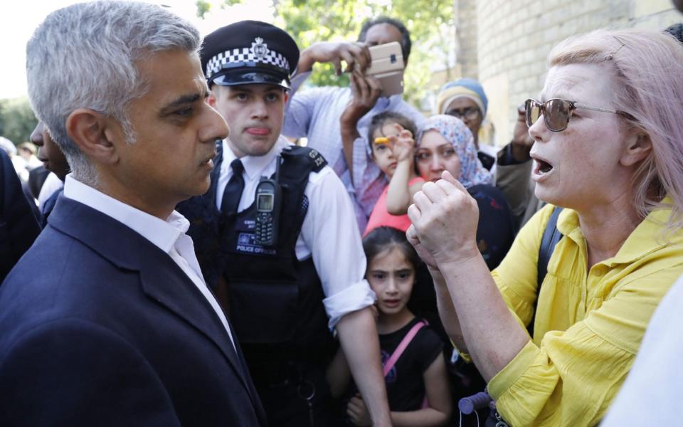 Mayor of London Sadiq Khan meets residents while visiting Grenfell Tower,  - Credit: Tolga Akmen/AFP