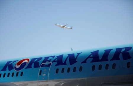 FILE PHOTO: The logo of Korean Airlines is seen on a B787-9 plane at its aviation shed in Incheon, South Korea, February 27, 2017.  REUTERS/Kim Hong-Ji/File Photo