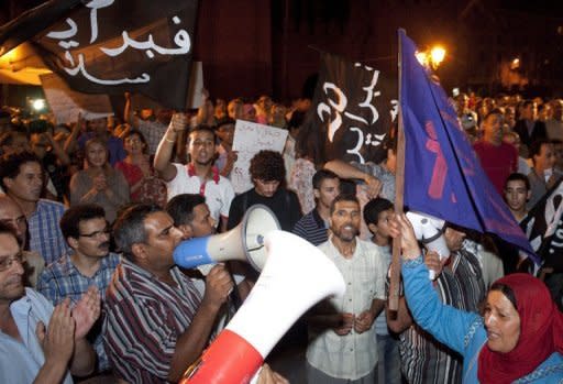 Rights groups, trade unionists and members of the February 20 movement protest against corruption, the high cost of living and other causes of social discontent in Rabat on August 11. Hundreds of activists took to the streets of Morocco's main cities to protest, according to AFP reporters and witnesses