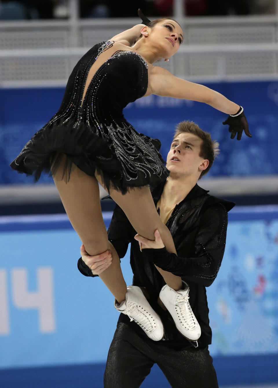 Elena Ilinykh and Nikita Katsalapov of Russia compete in the team free ice dance figure skating competition at the Iceberg Skating Palace during the 2014 Winter Olympics, Sunday, Feb. 9, 2014, in Sochi, Russia. (AP Photo/Bernat Armangue)
