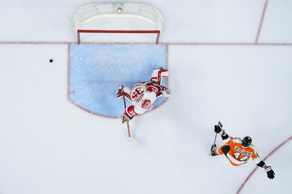 Philadelphia Flyers' Nicolas Deslauriers, right, celebrates after scoring a goal against Detroit Red Wings' Ville Husso during the second period of an NHL hockey game, Sunday, March 5, 2023, in Philadelphia. (AP Photo/Matt Slocum)