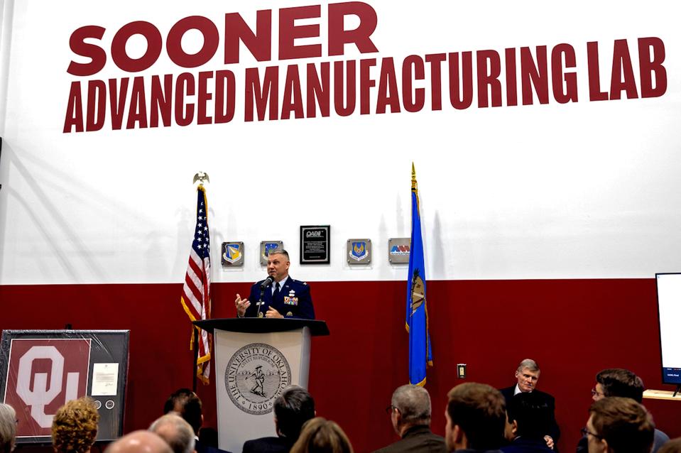 Col. Brian Moore speaks to government, military and defense industry leaders attending a grand opening event for the University of Oklahoma's new Sooner Advanced Manufacturing Lab.