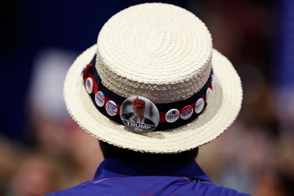 A delegate shows off support for Donald Trump during the third day session of the Republican National Convention in Cleveland, Ohio, in 2016. This year's Republican convention, which opens Monday, will be a much smaller affair.