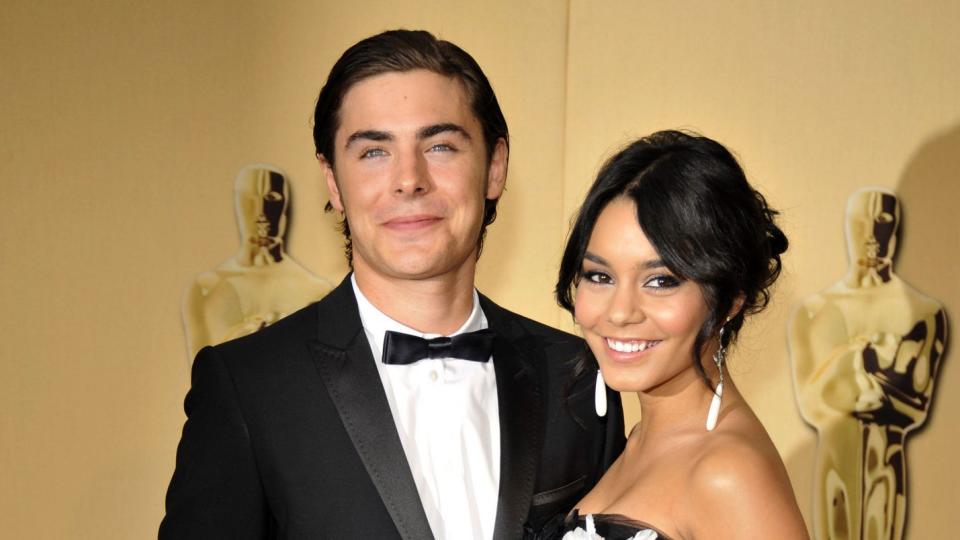 Zac Efron and Vanessa Hudgens posing together for the Oscars