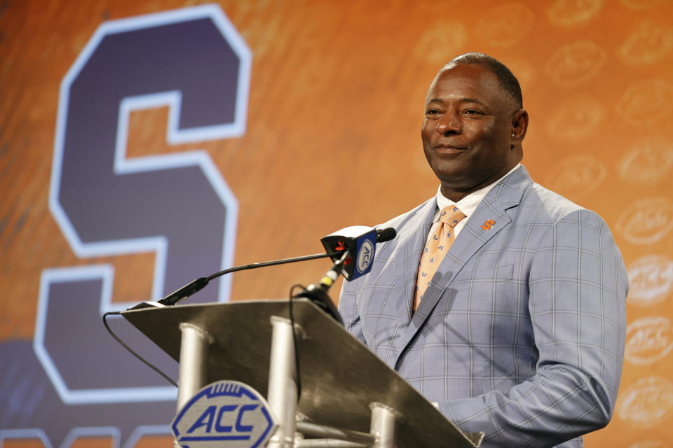 FILE - Syracuse head coach Dino Babers listens to a question at the NCAA college football Atlantic Coast Conference Media Days in Charlotte, N.C., Wednesday, July 20, 2022. Syracuse fired coach Dino Babers on Sunday, Nov. 19, after eight years with the Orange that included just two bowl appearances. (AP Photo/Nell Redmond, File)