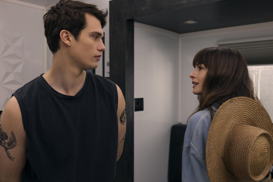 This image released by Prime shows Nicholas Galitzine, left, and Anne Hathaway in a scene from "The Idea of You." (Prime via AP)