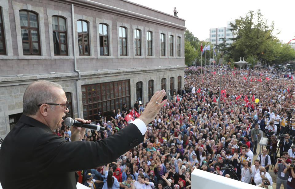 Turkey's President Recep Tayyip Erdogan addresses his supporters in Black Sea city of Trabzon, Turkey, Sunday, Aug. 12, 2018. (Presidential Press Service pool via AP)