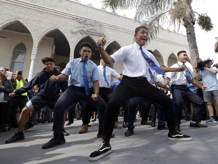 Students from Punchbowl Boys High School perform the New Zealand Maori tradition dance called a haka after Friday prayers at Imam Ali bin Abi Taleb Mosque in Sydney, Australia, Friday, March 22, 2019. The performance is to show support for New Zealand Muslims after 50 people were killed in attacks at Christchurch mosques last week. (AP Photo/Rick Rycroft)