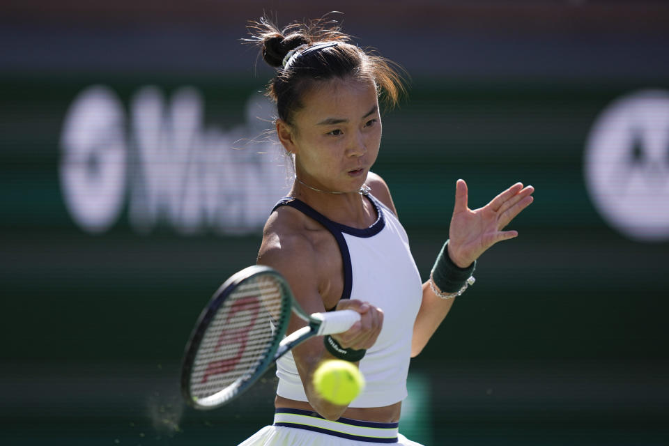 Yue Yuan, of China, returns to Coco Gauff, of the United States, during a quarterfinal match at the BNP Paribas Open tennis tournament, Thursday, March 14, 2024, in Indian Wells, Calif. (AP Photo/Mark J. Terrill)